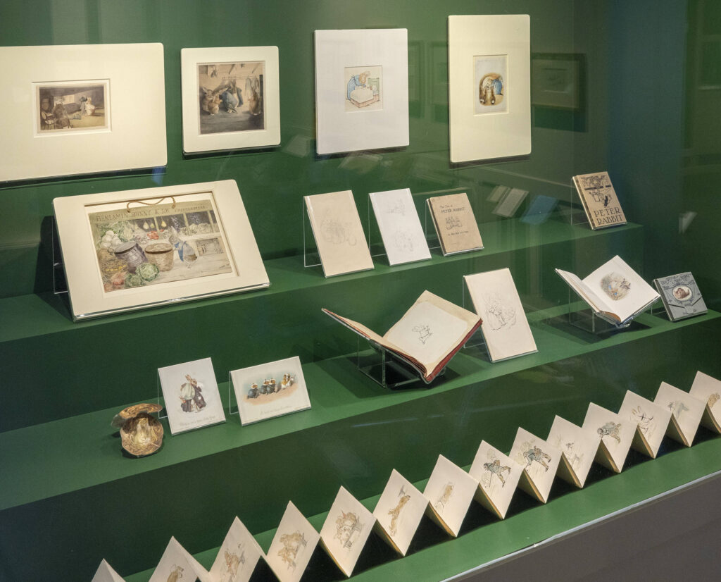 Immersive lighting design by Michael Grubb Studio enhanced the Beatrix Potter temporary exhibition at the V&A, bringing Potter's life and work to vivid light.