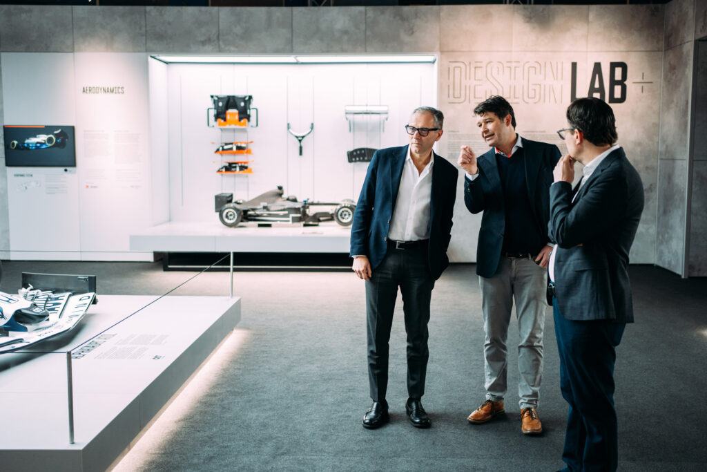 Immersive lighting design by Michael Grubb Studio brings the Formula 1® Exhibition to life, shaping each gallery’s atmosphere to enhance the drama, speed, and spectacle of the sport’s most defining moments.