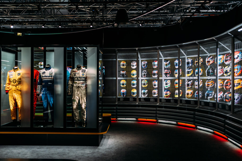 Immersive lighting design by Michael Grubb Studio brings the Formula 1® Exhibition to life, shaping each gallery’s atmosphere to enhance the drama, speed, and spectacle of the sport’s most defining moments.